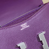 Side view of sleek structured handbag