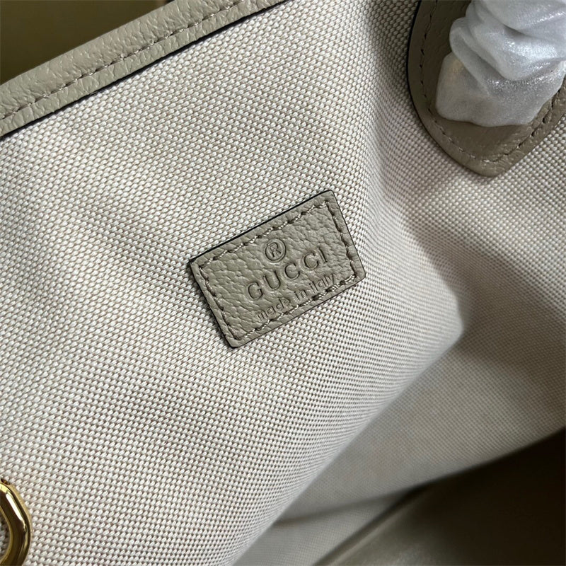 Side profile of everyday-luxe sleek women's handbag – women's luxury accessory