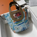  modern top-handle bag styled with outfit