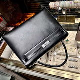  understated shoulder bag detail view showing craftsmanship