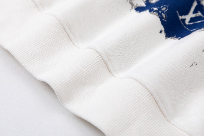 Side profile of Louis Vuitton luxury clothing with signature branding