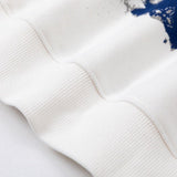 Side profile of Louis Vuitton luxury clothing with signature branding