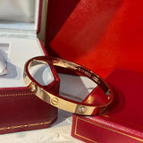 Close-up detail view of Cartier unisex jewelry piece
