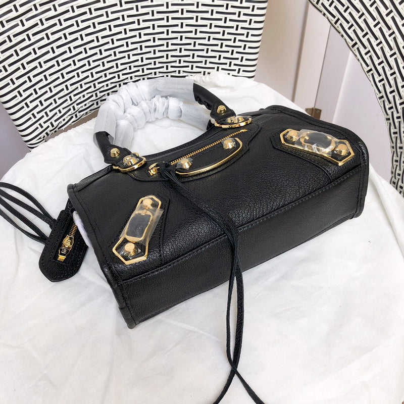 Styled lifestyle shot of statement structured women's handbag – women's statement bag