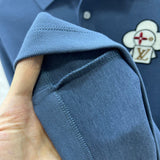 Side profile of Louis Vuitton luxury clothing with logo-detail design