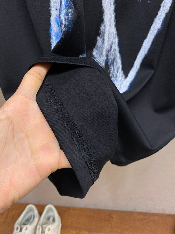 Side profile of Givenchy luxury clothing with everyday silhouette