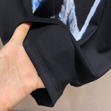 Side profile of Givenchy luxury clothing with everyday silhouette