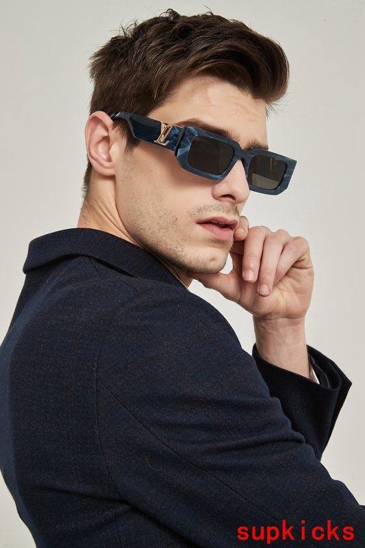 Close-up detail view of Louis Vuitton unisex sunglasses