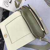 Front view of refined elevated women's handbag – women's luxury handbag