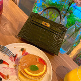 Side view of modern structured handbag