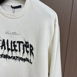 Full styled look of Louis Vuitton luxury clothing with signature branding