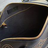  timeless top-handle bag detail view showing craftsmanship 8