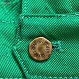 Flat lay presentation of Louis Vuitton luxury clothing with tailored silhouette