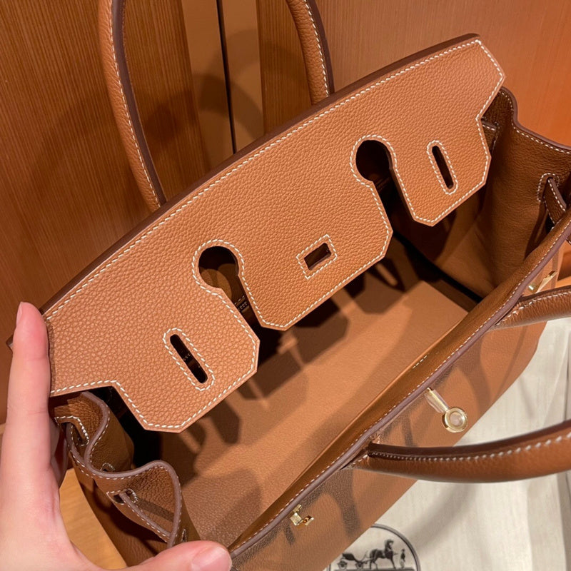 Side view of curated structured handbag