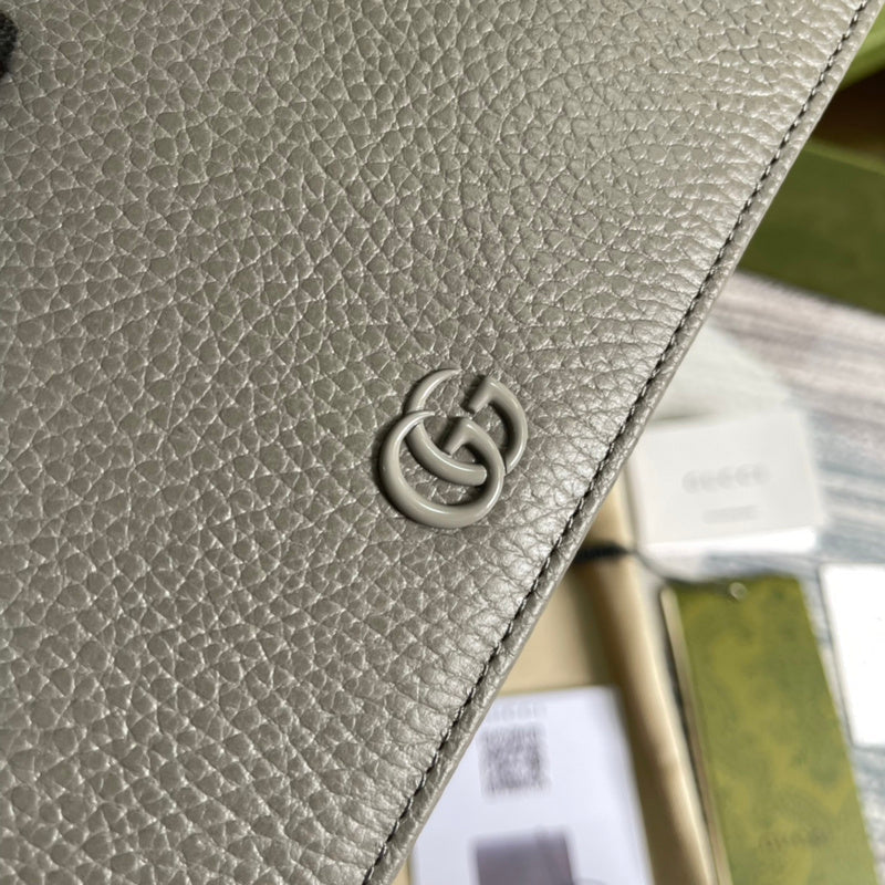 Handle and strap detail of statement everyday-luxe women's handbag – women's designer-style accessory