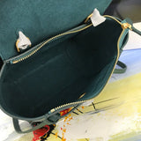 Handle and strap detail of statement modern women's handbag – women's premium purse