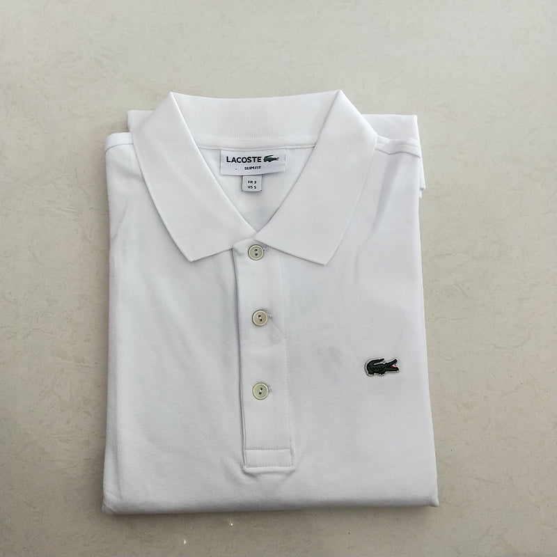 Side profile of Lacoste luxury clothing with signature branding