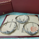 Front view of Cartier unisex jewelry piece