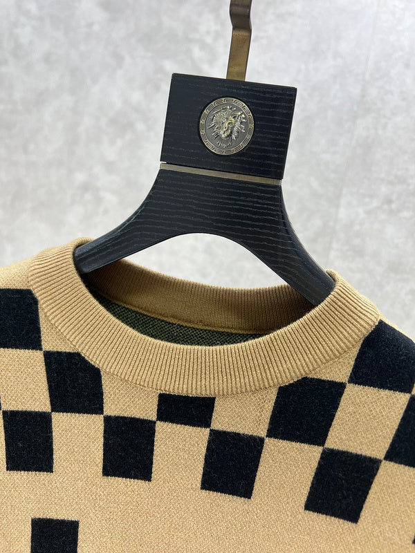 Close-up detail shot of Louis Vuitton luxury clothing with logo-detail design