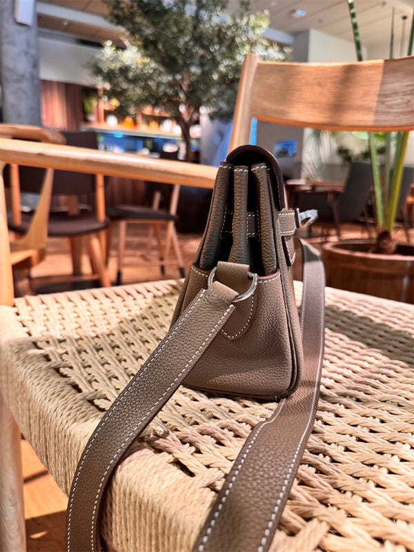 Side view of polished structured handbag