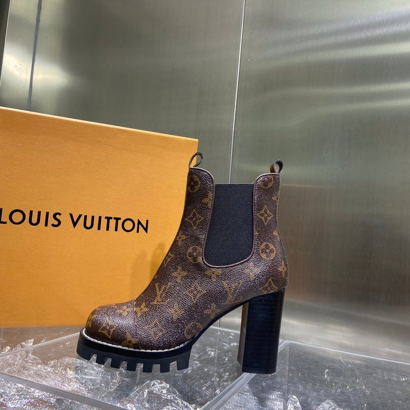 Louis Vuitton Beige Block Heel Pumps - Angled View