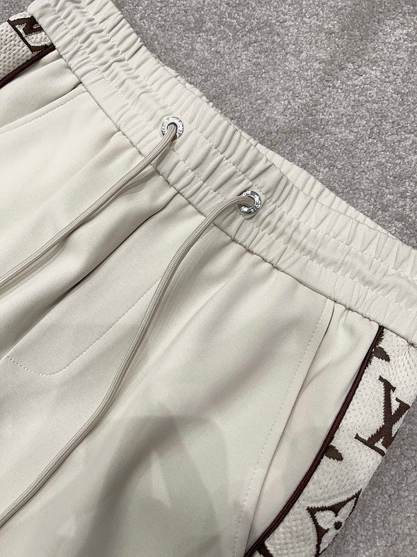 Close-up detail shot of Louis Vuitton luxury clothing with tailored silhouette