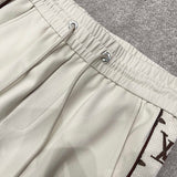 Close-up detail shot of Louis Vuitton luxury clothing with tailored silhouette