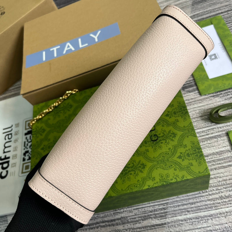 Styled lifestyle shot of chic signature women's handbag – women's luxury handbag