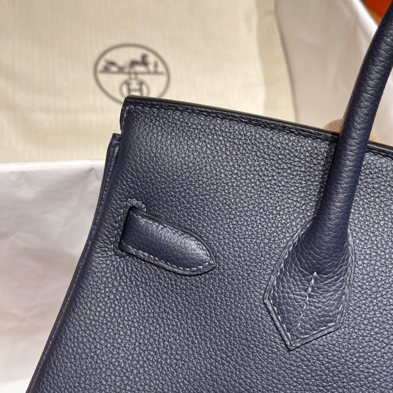 Close-up detail of curated bag design