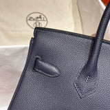 Close-up detail of curated bag design