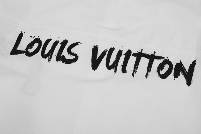 Flat lay presentation of Louis Vuitton luxury clothing with monogram-inspired silhouette