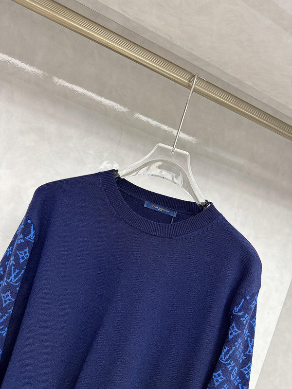 Flat lay presentation of Louis Vuitton luxury clothing with contemporary cut