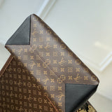  Contemporary top-handle bag carried on shoulder