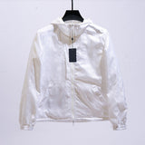 Close-up detail shot of Louis Vuitton luxury clothing with label-forward styling