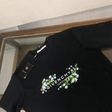 Close-up detail shot of Givenchy luxury clothing with relaxed-fit cut