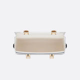 Close-up detail of sleek everyday-luxe women's handbag – women's designer-style accessory