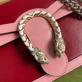 Back view of statement signature women's handbag – women's luxury accessory