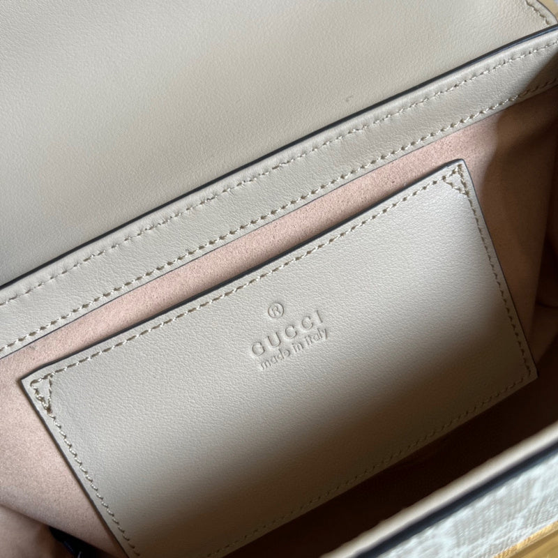 Side profile of structured statement women's handbag – women's designer-style accessory