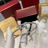 Close-up detail view of Cartier unisex jewelry piece
