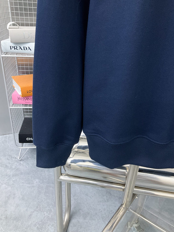 Front view of Louis Vuitton luxury clothing with label-forward styling