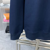 Front view of Louis Vuitton luxury clothing with label-forward styling