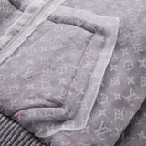 Full styled look of Louis Vuitton luxury clothing with tailored silhouette