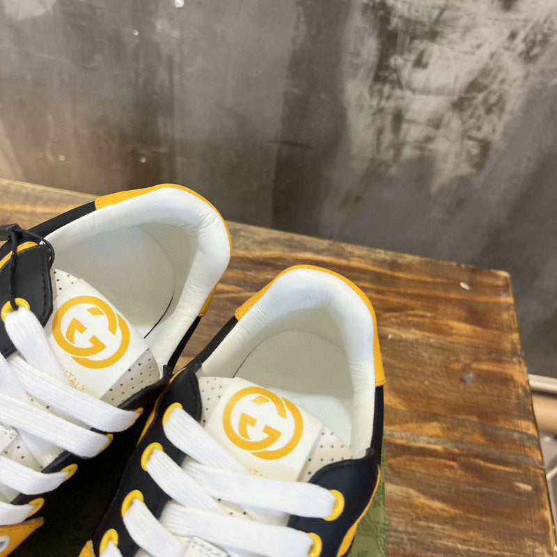 Gucci classic monochrome luxury sneakers view 4 retro runner design