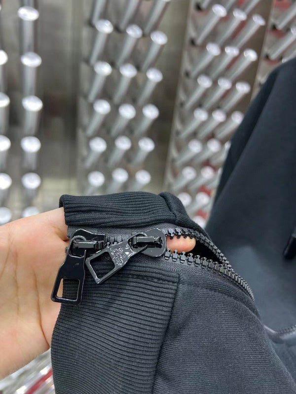 Close-up detail shot of Louis Vuitton luxury clothing with everyday silhouette