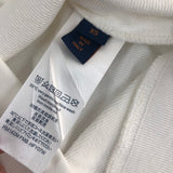 Side profile of Louis Vuitton luxury clothing with relaxed-fit cut