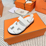 Hermès Black Crisscross Strap Sandals - Lifestyle Styling Shot