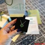 Lifestyle view of Van Cleef & Arpels unisex jewelry piece