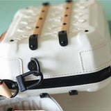  crossbody bag close-up of hardware and finish