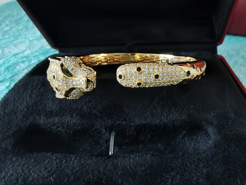 Close-up detail view of Cartier unisex jewelry piece