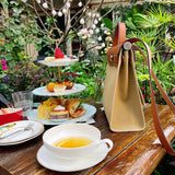 Side view of timeless structured handbag